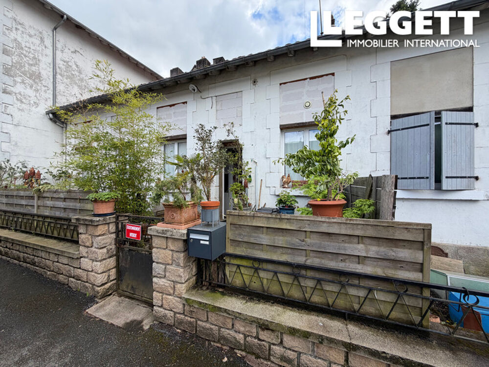 Maison de ville séparée en 3 appartements indépendants avec terrains et garage, idéal investissement locatifs!