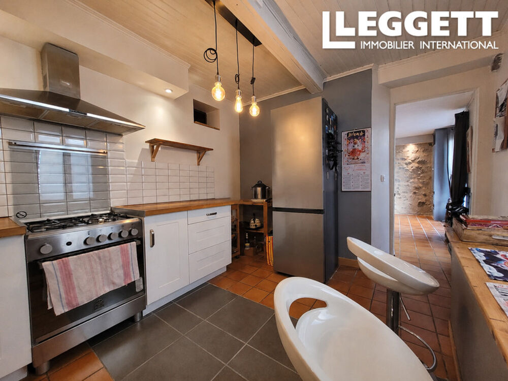 Maison en pierre rénovée du XIXe, 150 m², toit terrasse, 3 chambres, double salon, confort moderne