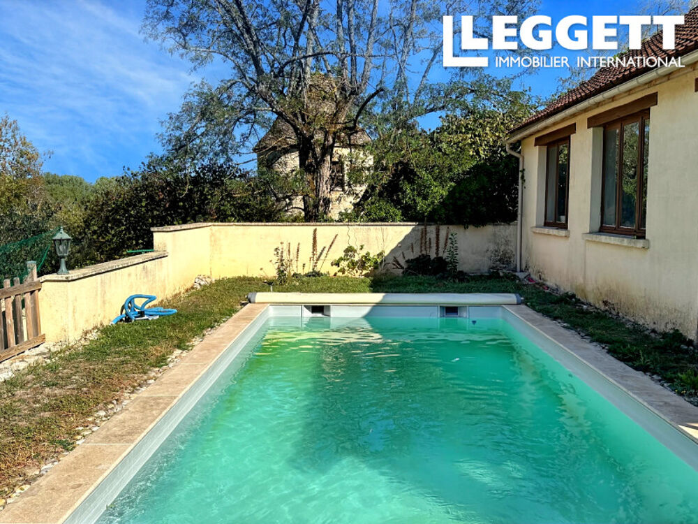 Vente Maison Charmante maison en pierre de 202 m² avec piscine, jardin fleuri et logement indépendant ThÉdirac