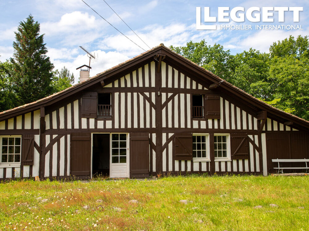 Charmante landaise de caractère, ancien pavillon de chasse, sur 6,2 ha de forêt avec piscine et dépendances