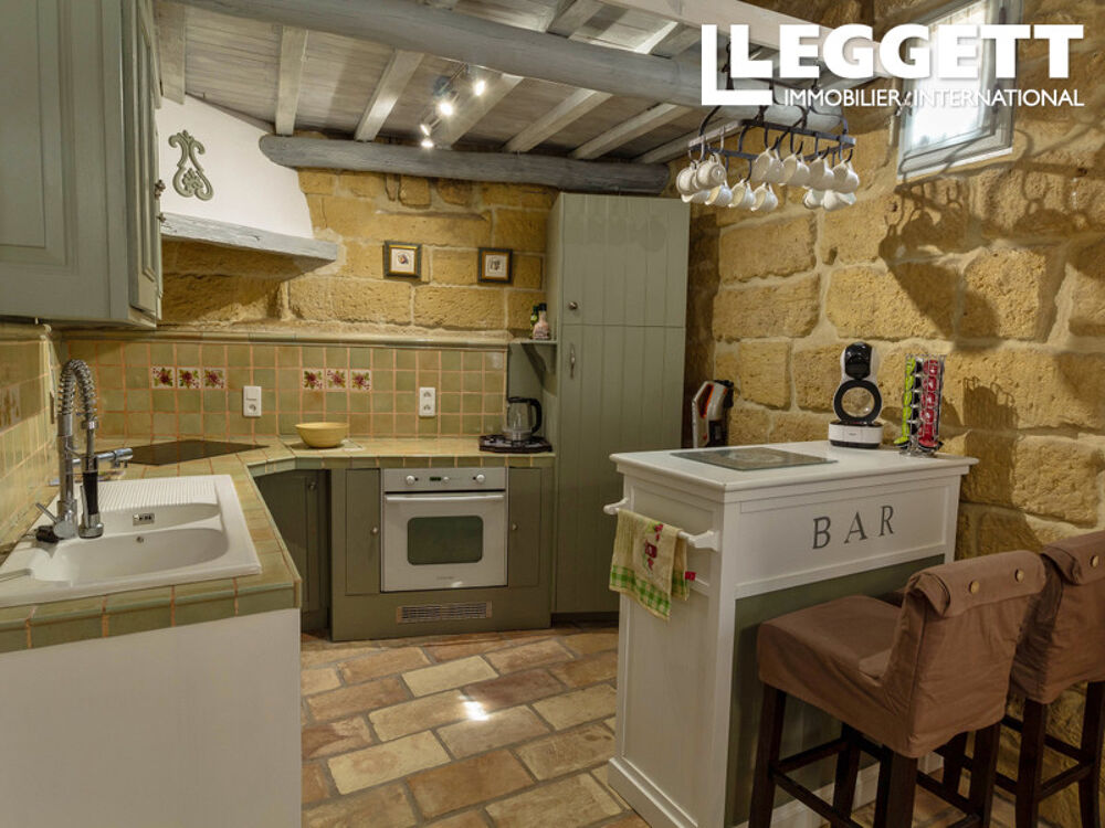 Vente Maison Élégante maison de ville en pierre du XVIIIe siècle avec cheminée au c?ur d?Uzès UzÈs