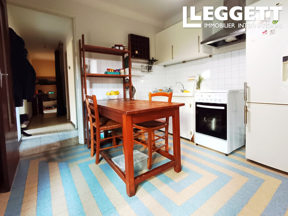 Avignon - 1ére ceinture - Appartement de 55m² avec cuisine, pièce à vivre, une chambre, sdb, jardin et garage.