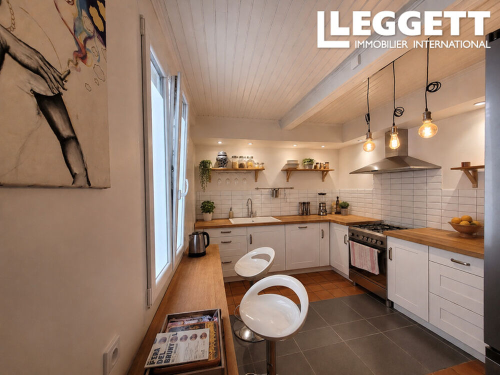 Maison en pierre rénovée du XIXe, 150 m², toit terrasse, 3 chambres, double salon, confort moderne
