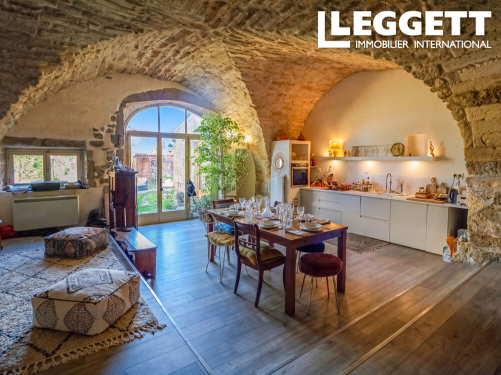 Vente Maison Charmante maison de village en pierre avec jardin et terrasse sur le toit avec vue dans un village animé. Aigues-vives