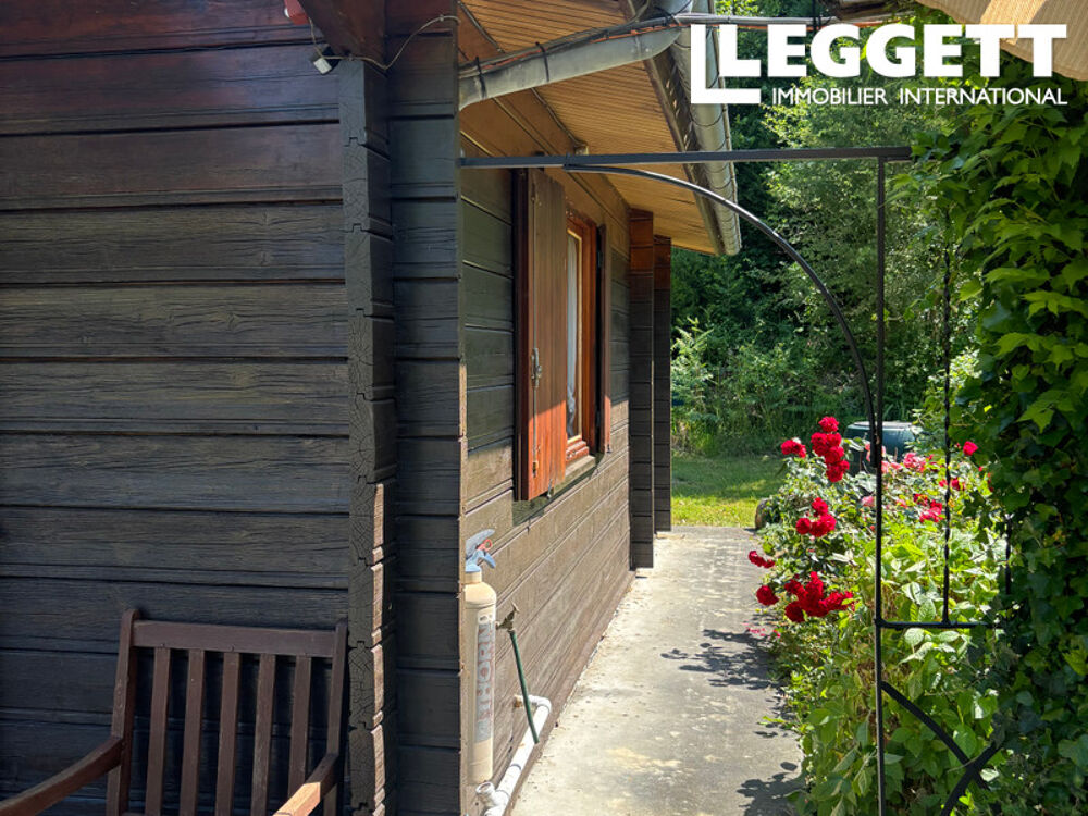 Vente Maison Un petit coin de paradis : un chalet en bois avec un étang de pêche, niché dans la magnifique campagne françai Ladignac-le-long