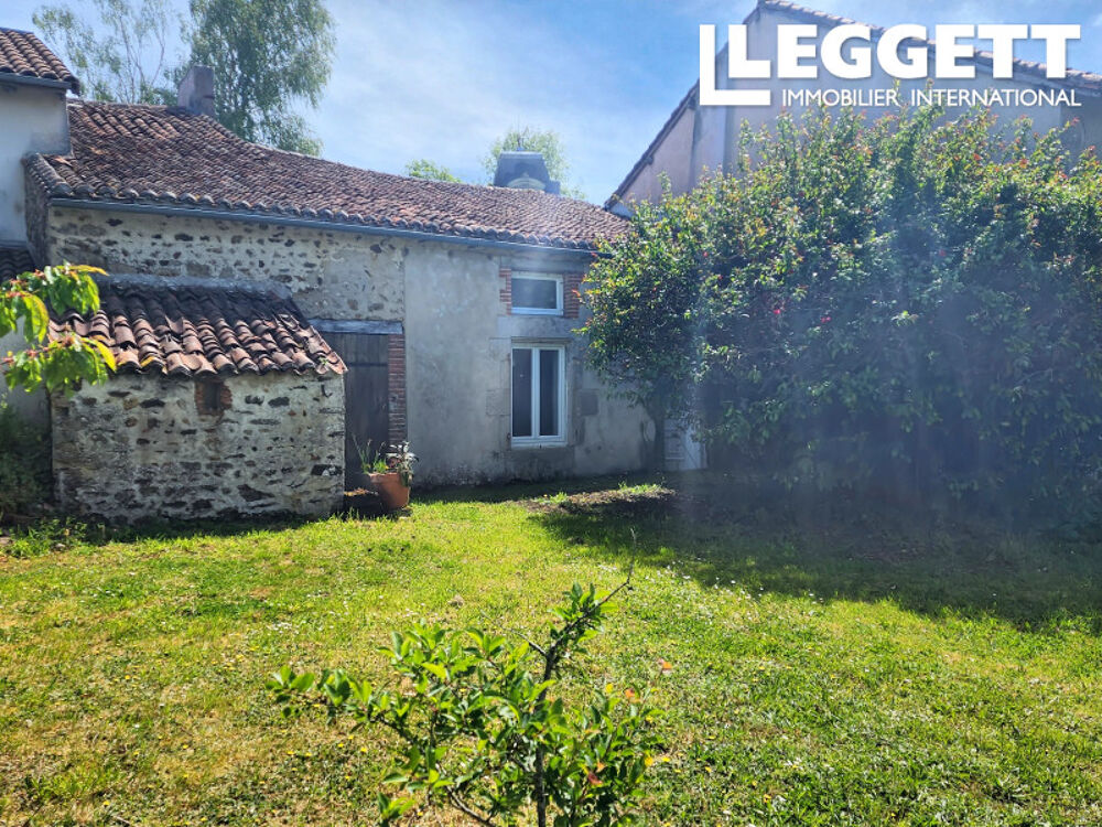 Maison de village partiellement rénovée de 100 m2 avec sa grange attenante et jardin de 450 m2