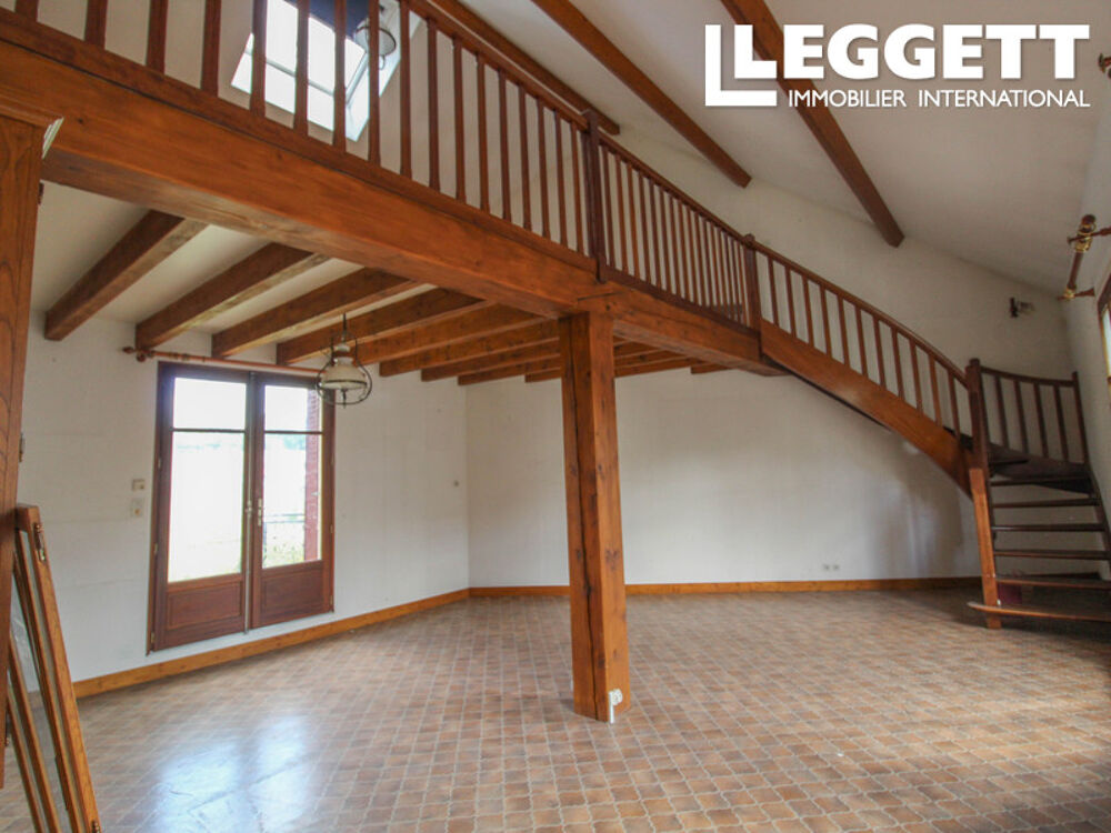 Vente Maison Maison de 4 chambres à proximité des commerces avec un superbe séjour avec mezzanine, garages, cave et jardin. Bellac