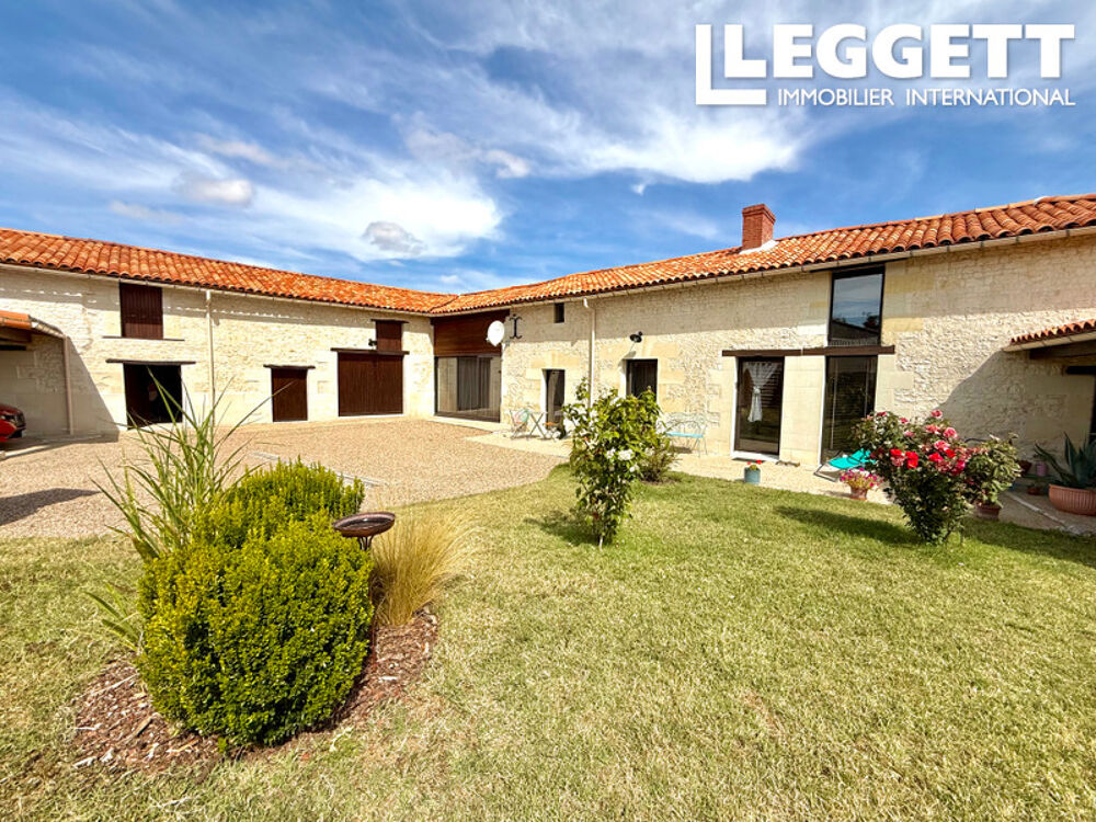Vente Maison Sud Val de Loire : maison en pierre, dépendances, 3 chambres dont 1 de plain-pied, terrain clos de 3 300 m². La roche-rigault