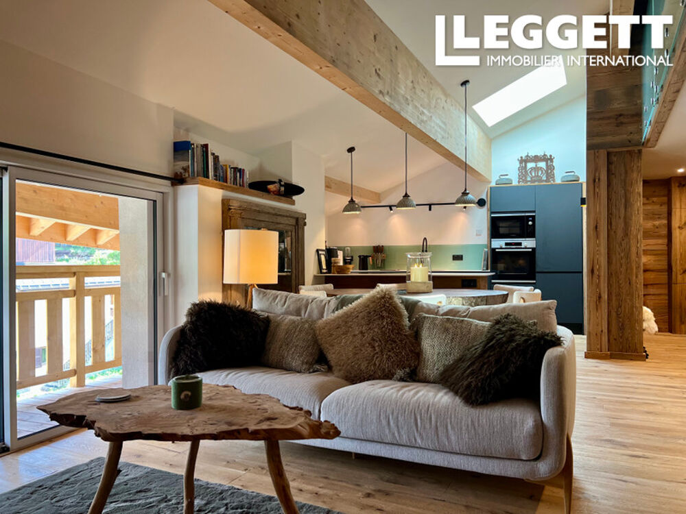 Magnifique appartement rénové de 2 chambres avec mezzanine, 94 m², parking privé, emplacement privilégié.