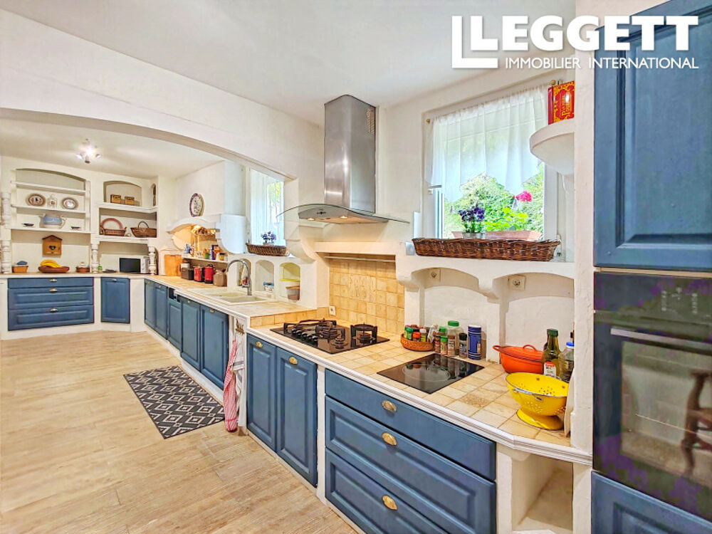 Coup de c?ur : belle maison familiale avec appartement, garages et jardins clos dominant la rivière