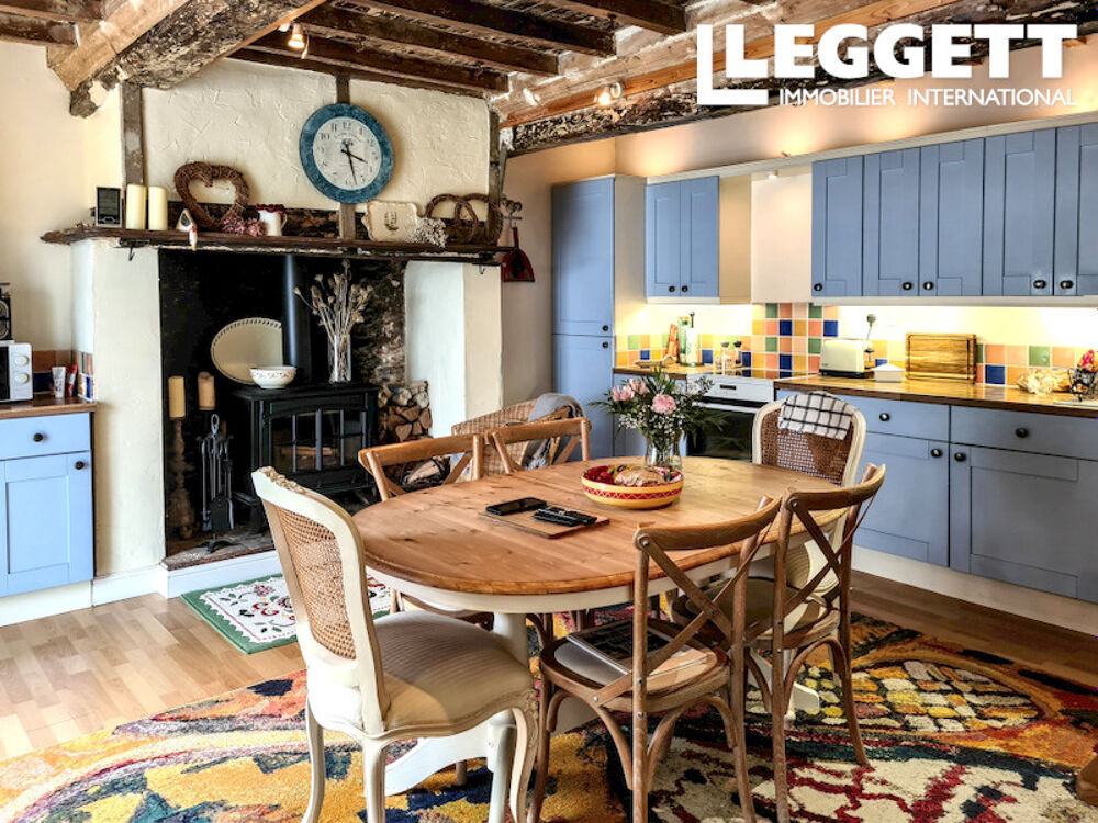 Maison 3 chambres avec véranda, jardin, garage et parking, à 5 min des commerces