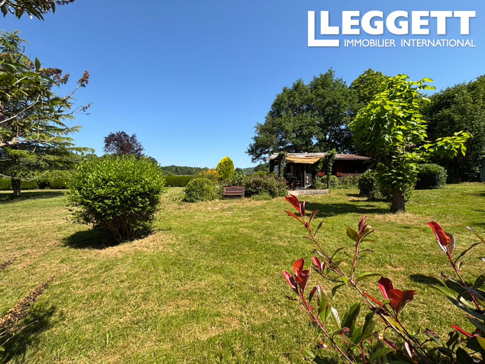 Vente Maison Un petit coin de paradis : un chalet en bois avec un étang de pêche, niché dans la magnifique campagne françai Ladignac-le-long