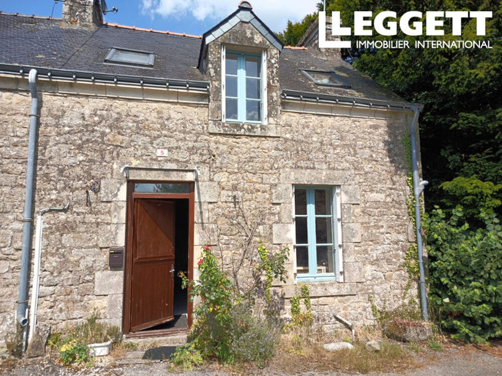 Une jolie propriété de village avec jardin.
