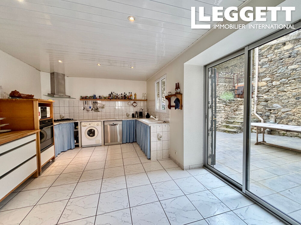 Vente Maison Spacieuse maison de village en pierre avec terrasses, jardin avec vue sur les montagnes, piscine et grand gara Olette