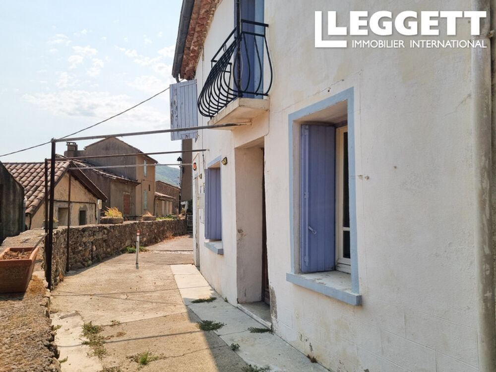 Maison de village en pierres avec balcon, belles vues et éléments de caractère