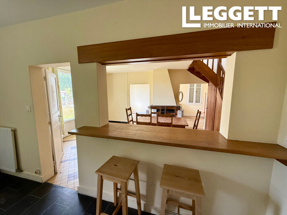 Maison de village spacieuse avec 3 chambres, garage et jardin