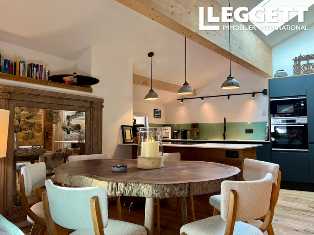 Magnifique appartement rénové de 2 chambres avec mezzanine, 94 m², parking privé, emplacement privilégié.