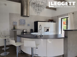 Vente Maison Élégante maison de village en pierres rénovée avec piscine, cour intime au c?ur de Villemagne l'Argentière Villemagne-l'argentiÈre