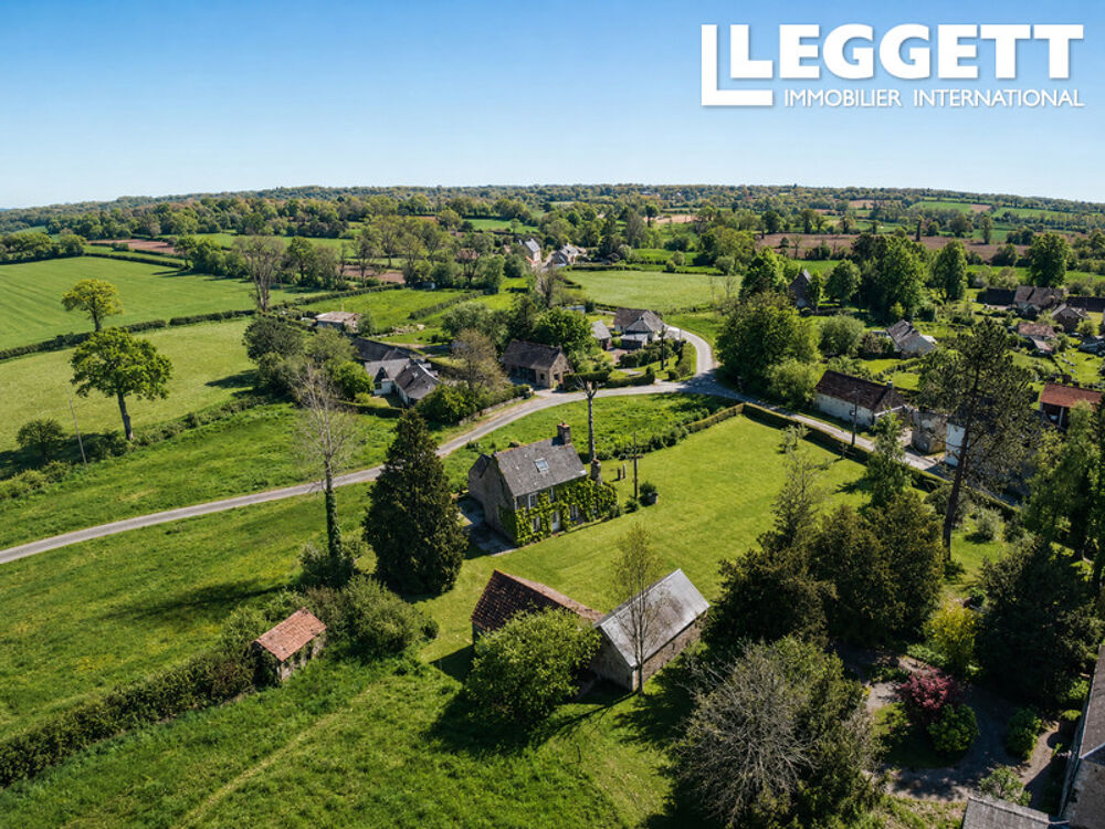Vente Maison Une charmante maison de 4 chambres, 130 m2  dans un cadre bucolique avec un grand jardin et un garage. Rauville-la-place
