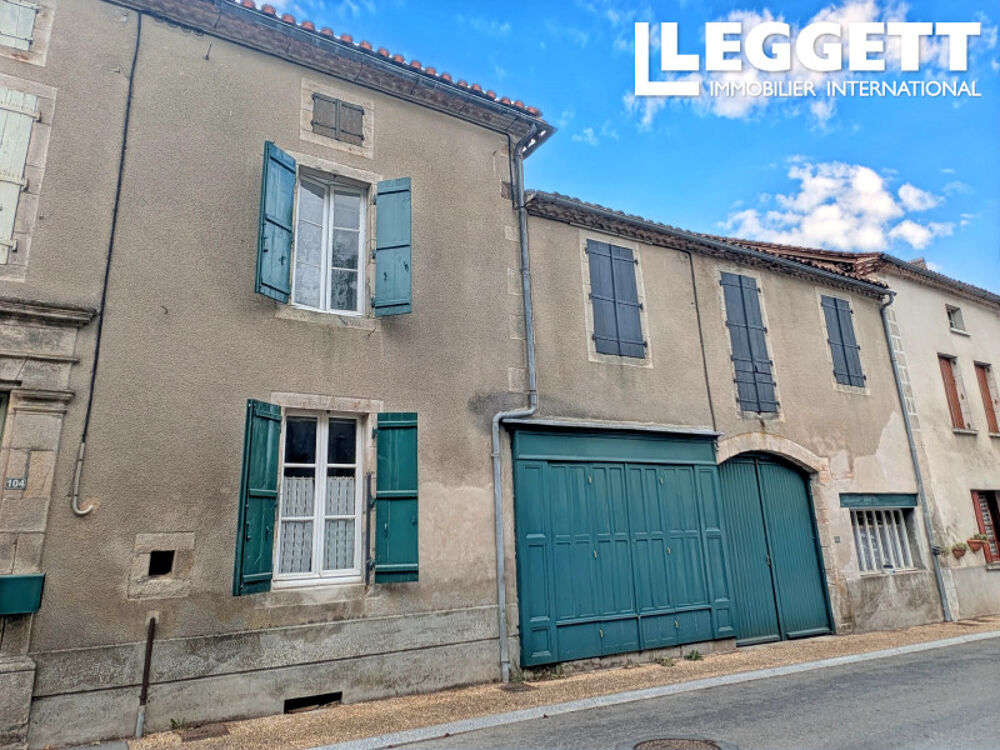 Maison de village en pierre avec jardin et garage