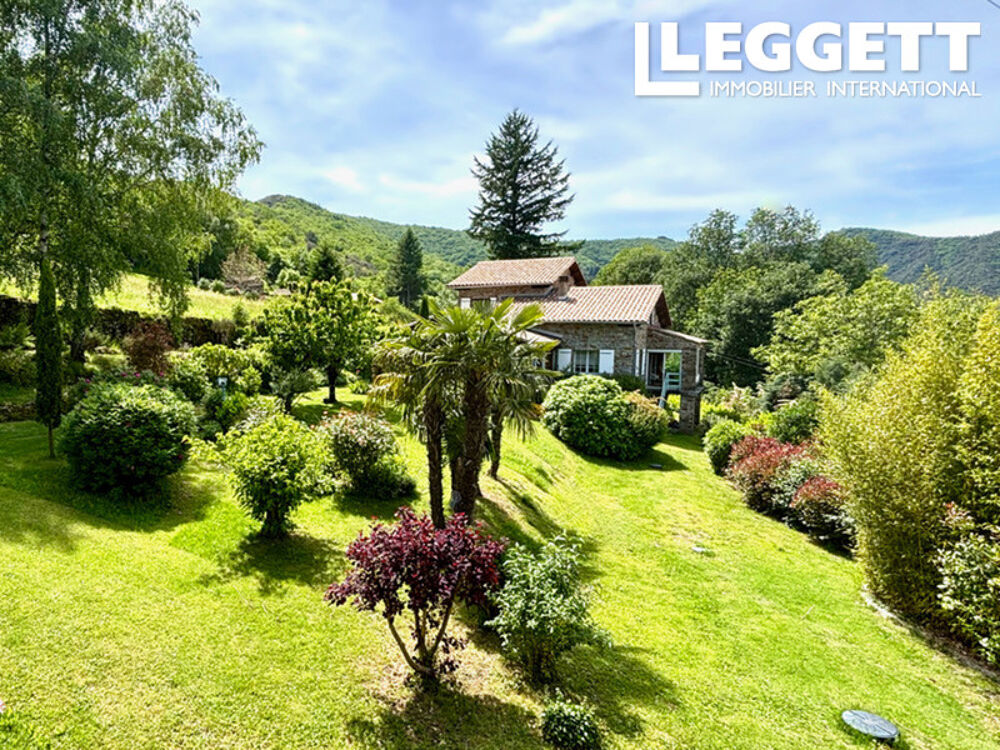 Vente Maison Saumane - GARD - Propriété avec deux maisons séparées, dont une avec piscine intérieure et beau jardin paysage Saumane