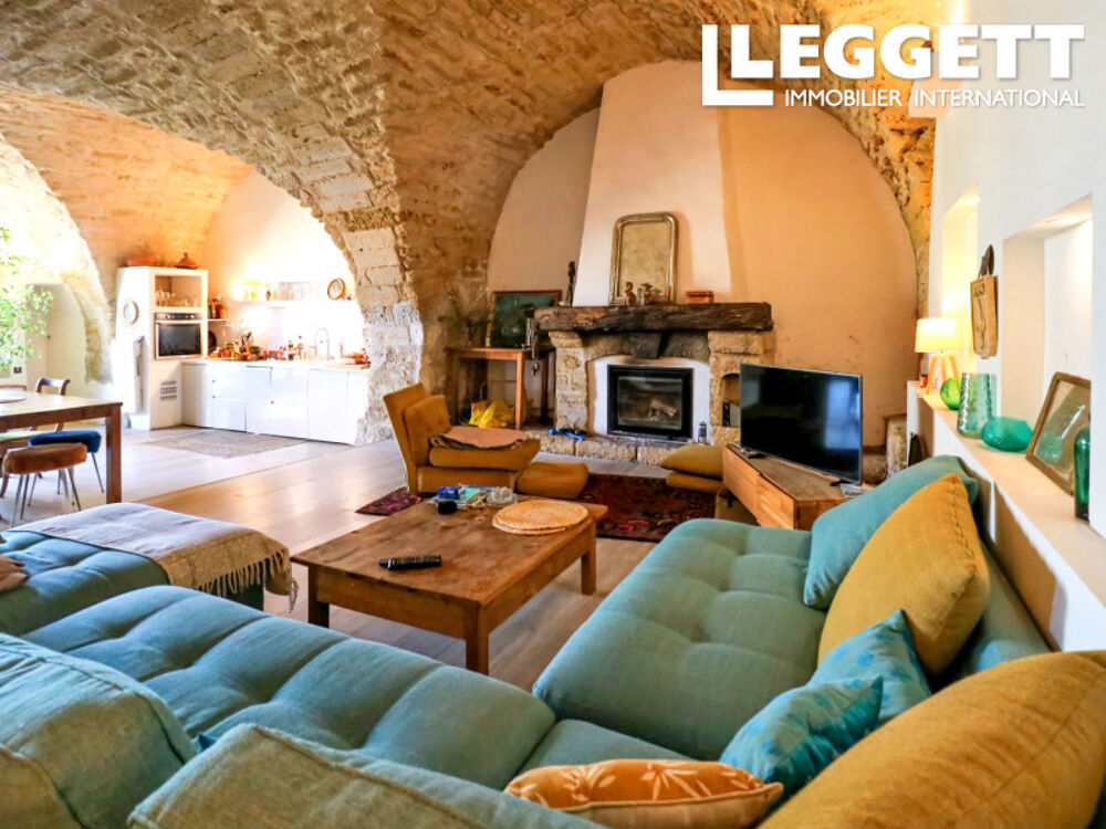 Vente Maison Charmante maison de village en pierre avec jardin et terrasse sur le toit avec vue dans un village animé. Aigues-vives
