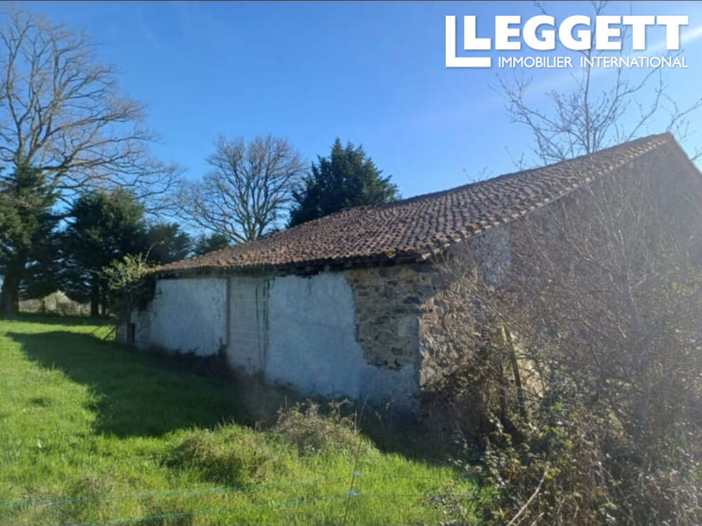 Superbe terrain comprenant une grange existante avec hangar attenant, une fosse septique et une parcelle de bo