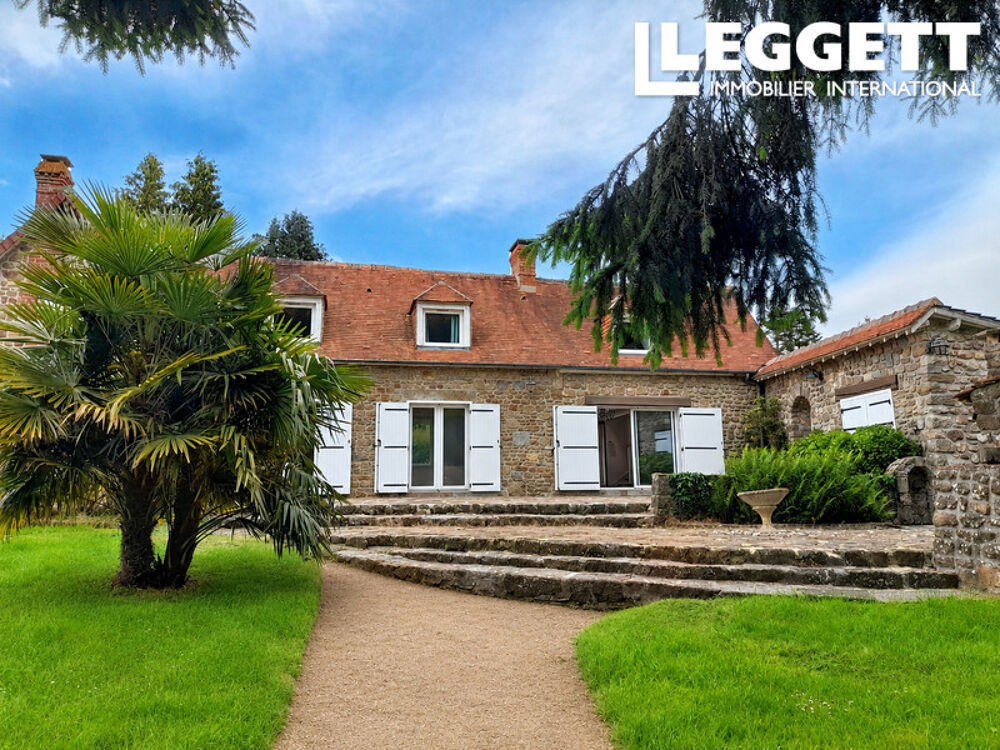 Vente Maison Maison en prierre avec jardin et view dégagée sur la campagne. Salon avec plafond cathédral et balcon. RÂnes