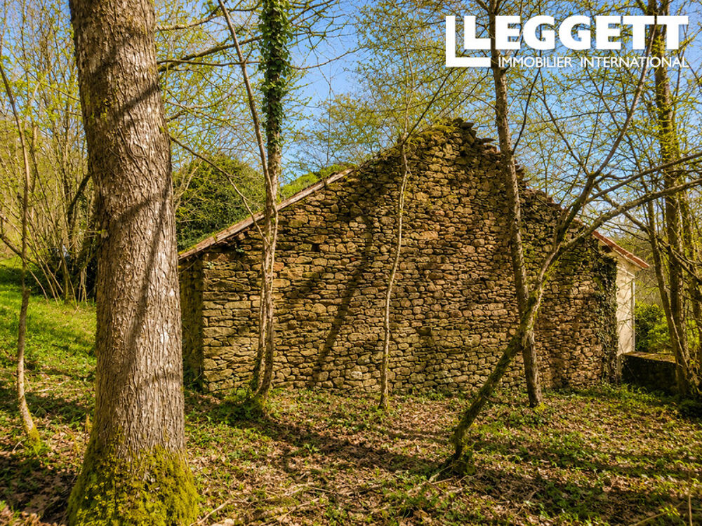 Beau terrain avec une grange en ruine avec CU