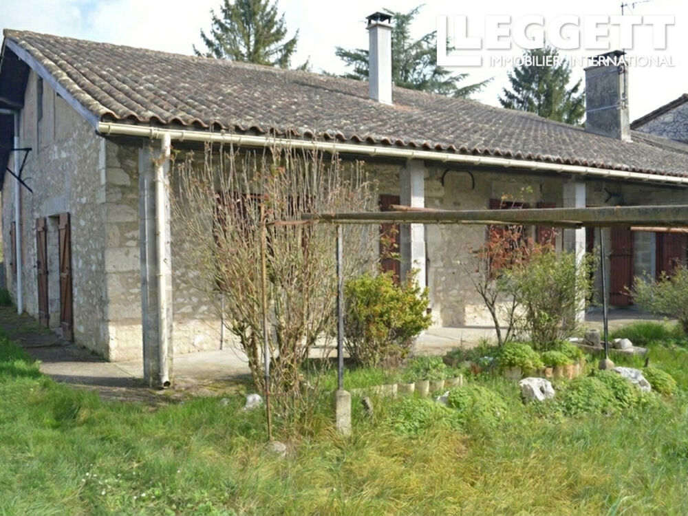 A 5 minutes de DURAS, Gros potentiel pour cette maison en pierre à restaurer avec son jardin arboré et clôturé