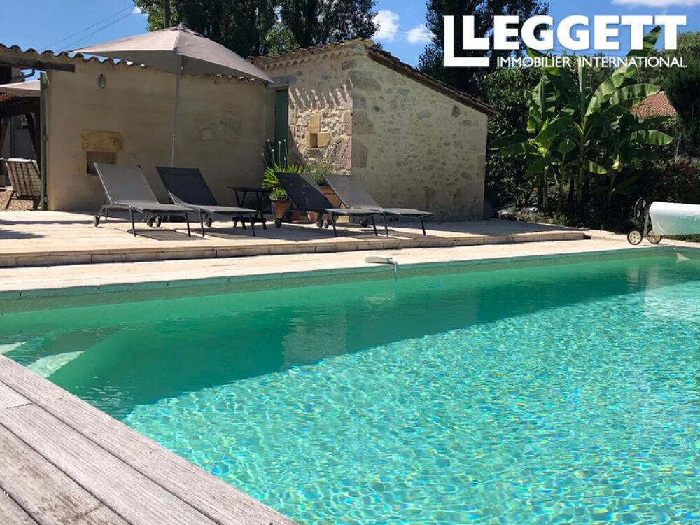 Vente Maison Exceptionnelle propriété rénovée avec 3 maisons séparées, un total de 12 chambres, 8 salles de bains et un lac Saint-mÉard-de-gurÇon