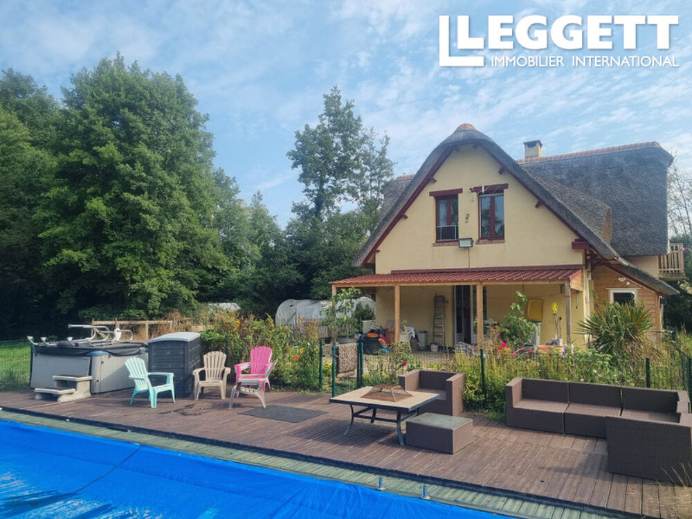 Vente Maison Chaumière de 4 chambres avec étang de pêche sur un terrain de 1,6 hectare, près de Ballots. Ballots