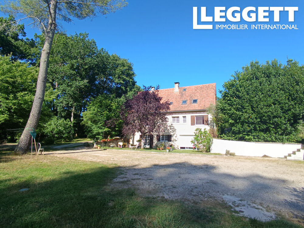 Maison Fort potentiel sur 3 niveaux avec grand jardin arboré