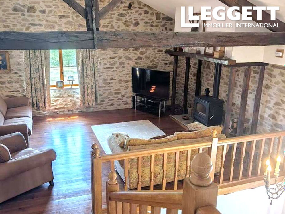 Vente Maison Fermette de 4 chambres avec de grands espaces de vie ouverts, atelier, garage, piscine hors-sol et terrain. Champsac