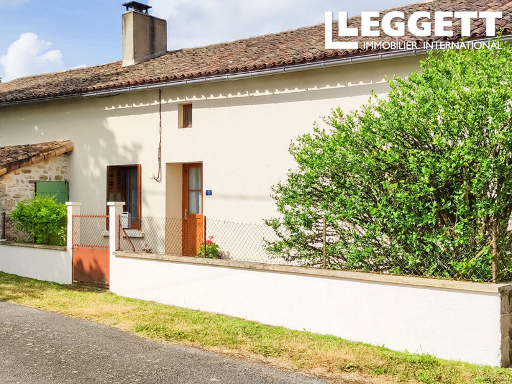 Maison individuelle offrant trois chambres , petit dépendance et jardin dans un endroit calme