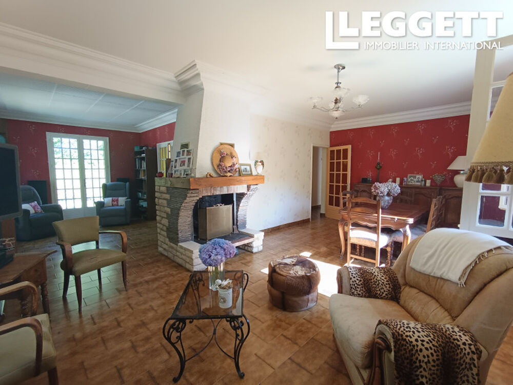 Maison Fort potentiel sur 3 niveaux avec grand jardin arboré