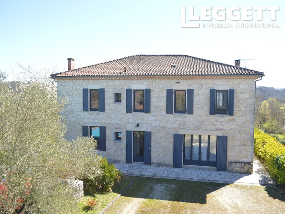 with unobstructed views of the hills, a beautiful stone property featuring a holiday cottage and a pool