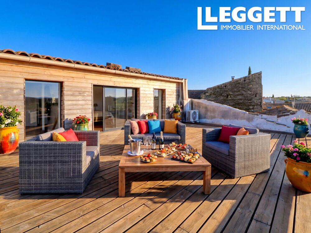 Vente Maison Charmante maison de village en pierre avec jardin et terrasse sur le toit avec vue dans un village animé. Aigues-vives