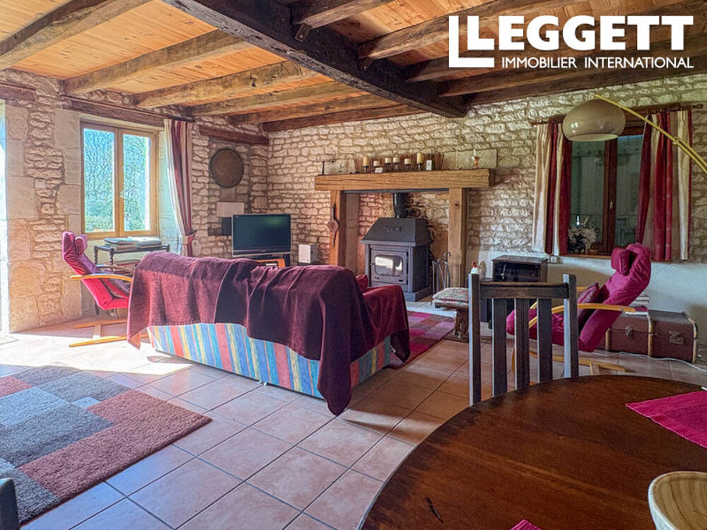 Maison en pierres avec grange et terrain