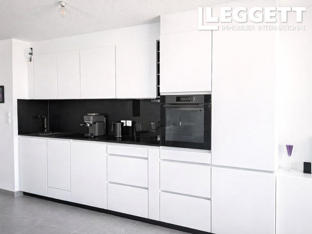Appartement tout confort avec parking, terrasse et rooftop dans quartier prisé de Sète