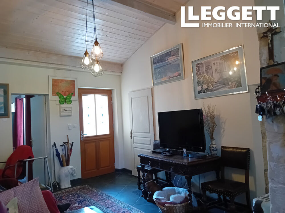 Maison en pierre de 4 chambres : un havre de paix dans un village de campagne, aux portes d'une grande ville.
