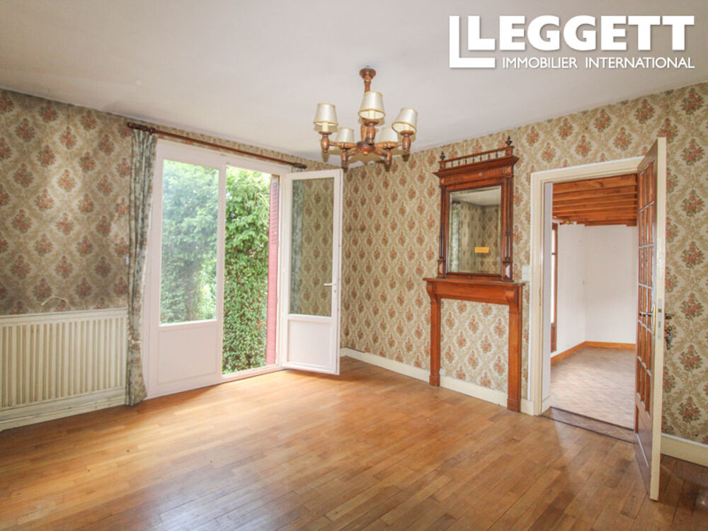 Vente Maison Maison de 4 chambres à proximité des commerces avec un superbe séjour avec mezzanine, garages, cave et jardin. Bellac