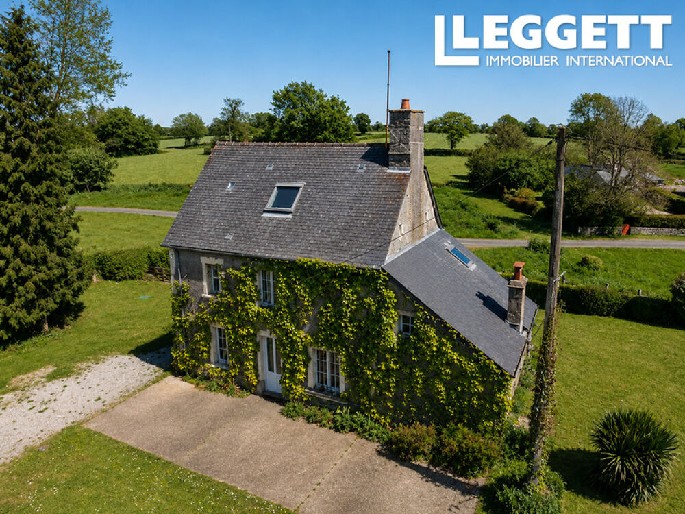 Une charmante maison de 4 chambres, 130 m2 dans un cadre bucolique avec un grand jardin et un garage.
