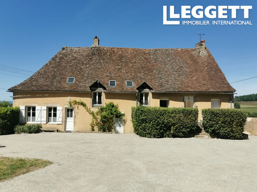 Maison de charme à la campagne en Saône-et-Loire avec 6 appartements et potentiel de construction