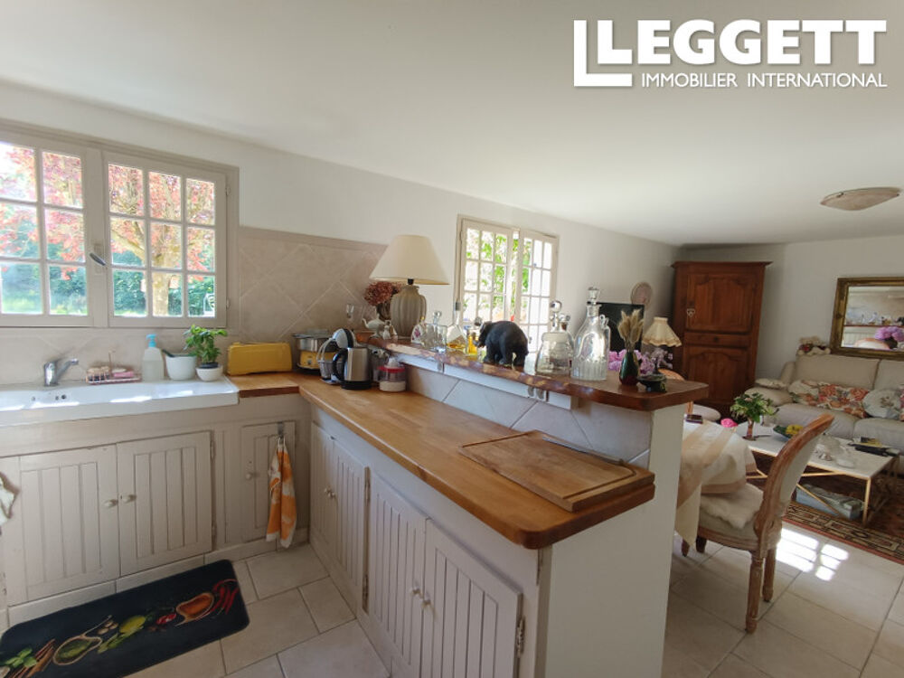 Maison Fort potentiel sur 3 niveaux avec grand jardin arboré