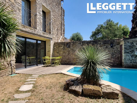   Élégante maison de village en pierres rénovée avec piscine, cour intime au c?ur de Villemagne l'Argentière Maison - 5 pièce(s) - 174 m²