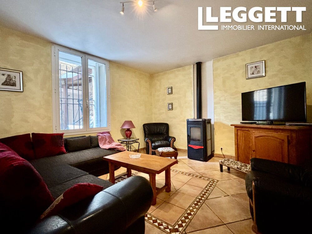 Élégante maison de village avec terrasse et local commercial