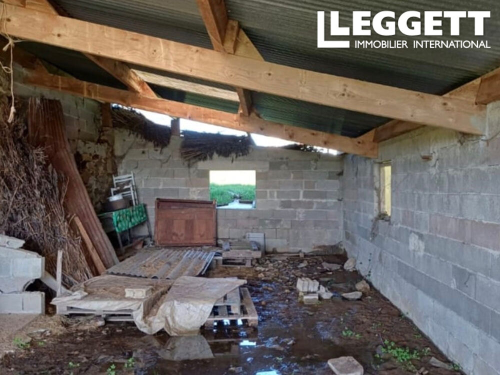 Superbe terrain comprenant une grange existante avec hangar attenant, une fosse septique et une parcelle de bo