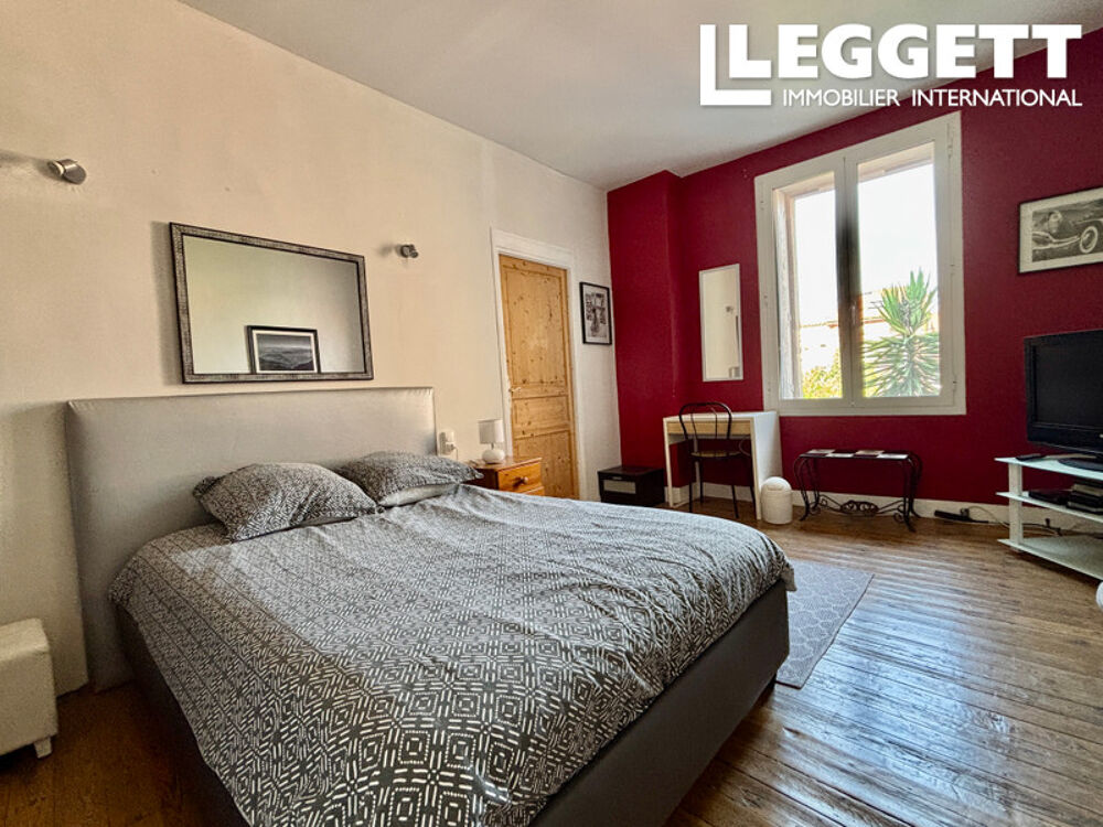 Élégante maison de village avec terrasse et local commercial