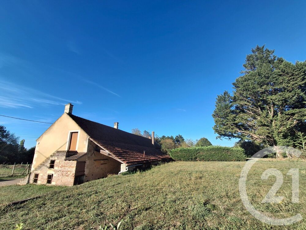 Nichée sur un terrain de 1332m², cette maison de campagn....